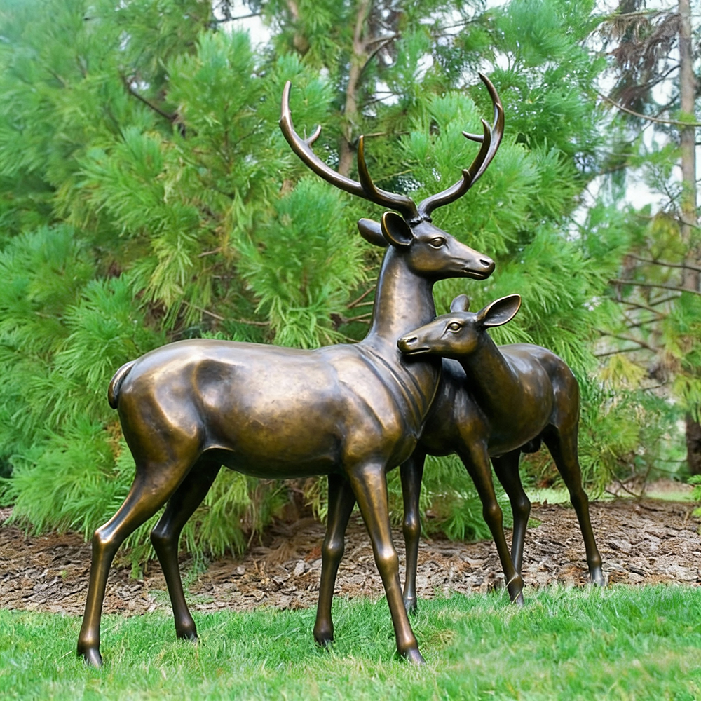 Stag and Doe Sculpture bronze pair standing on grass