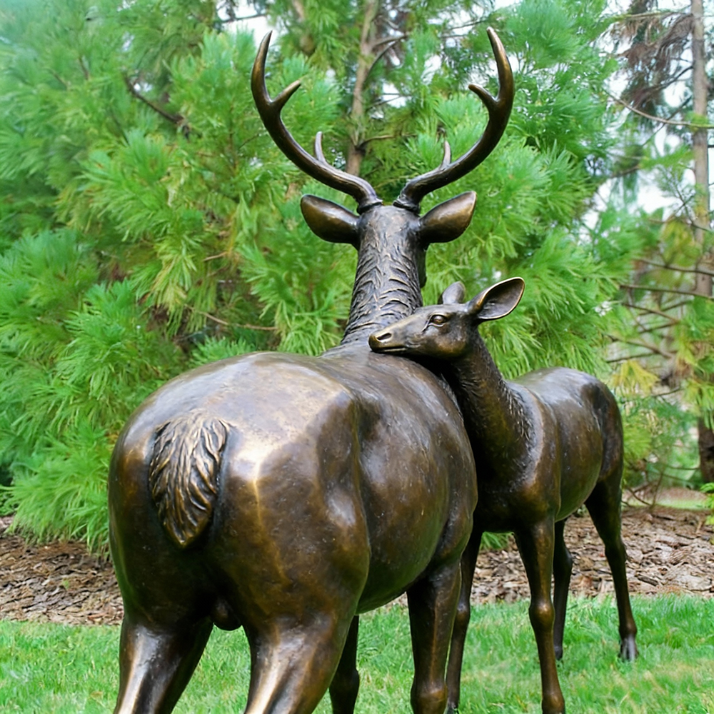 Stag and Doe Sculpture bronze touching pose outdoor
