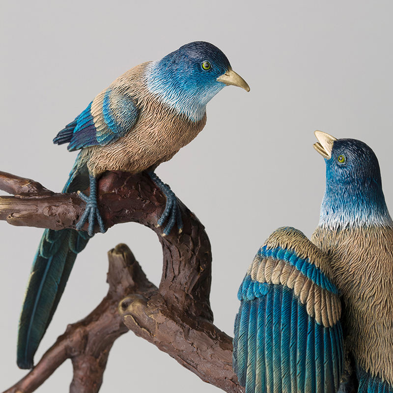 artistic bronze magpie sculpture with long tail