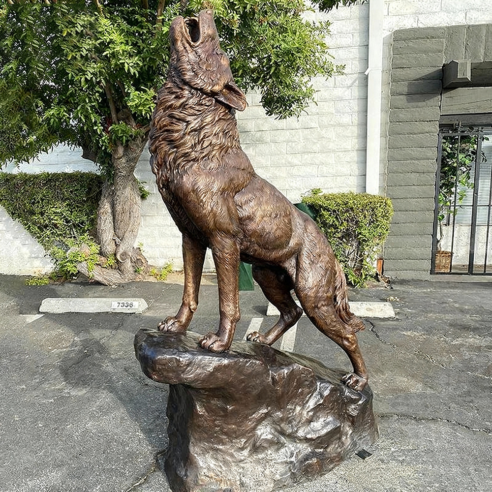 bronze Howling Wolf Sculpture on rock