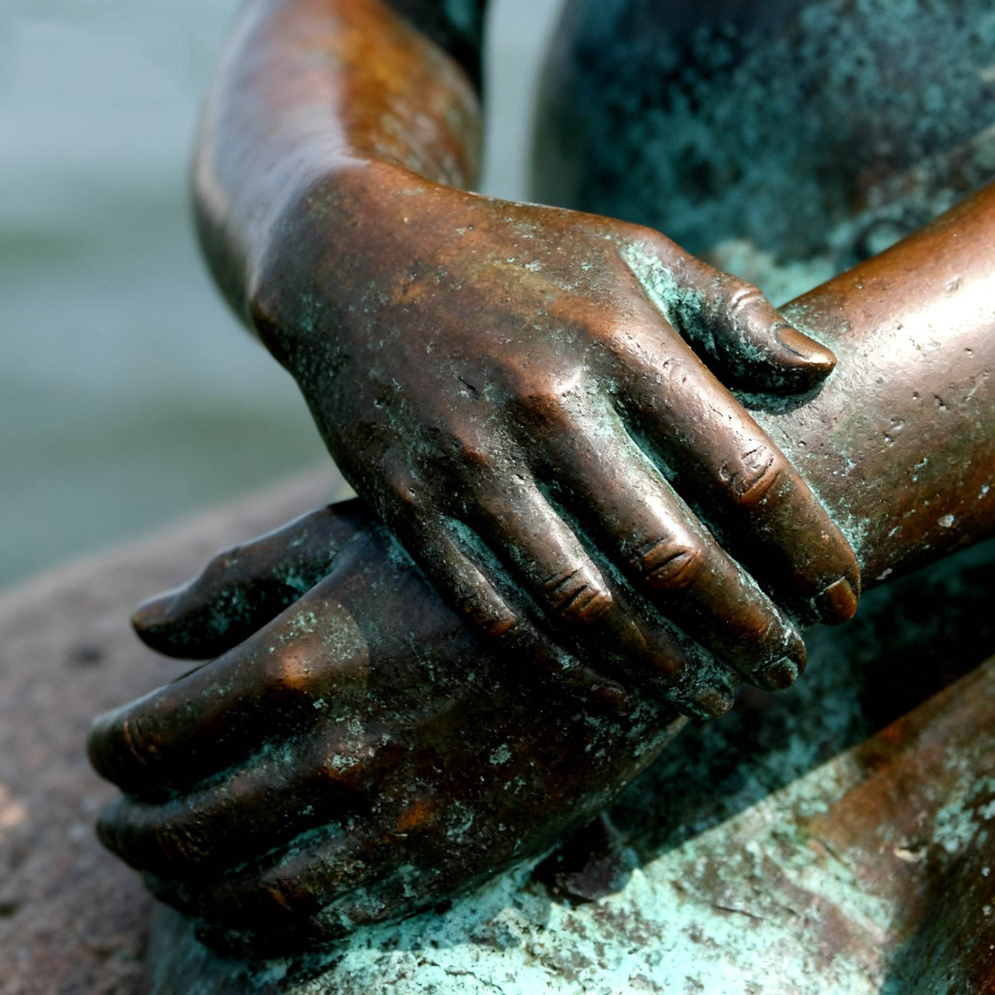 bronze Little Mermaid statue hands detail