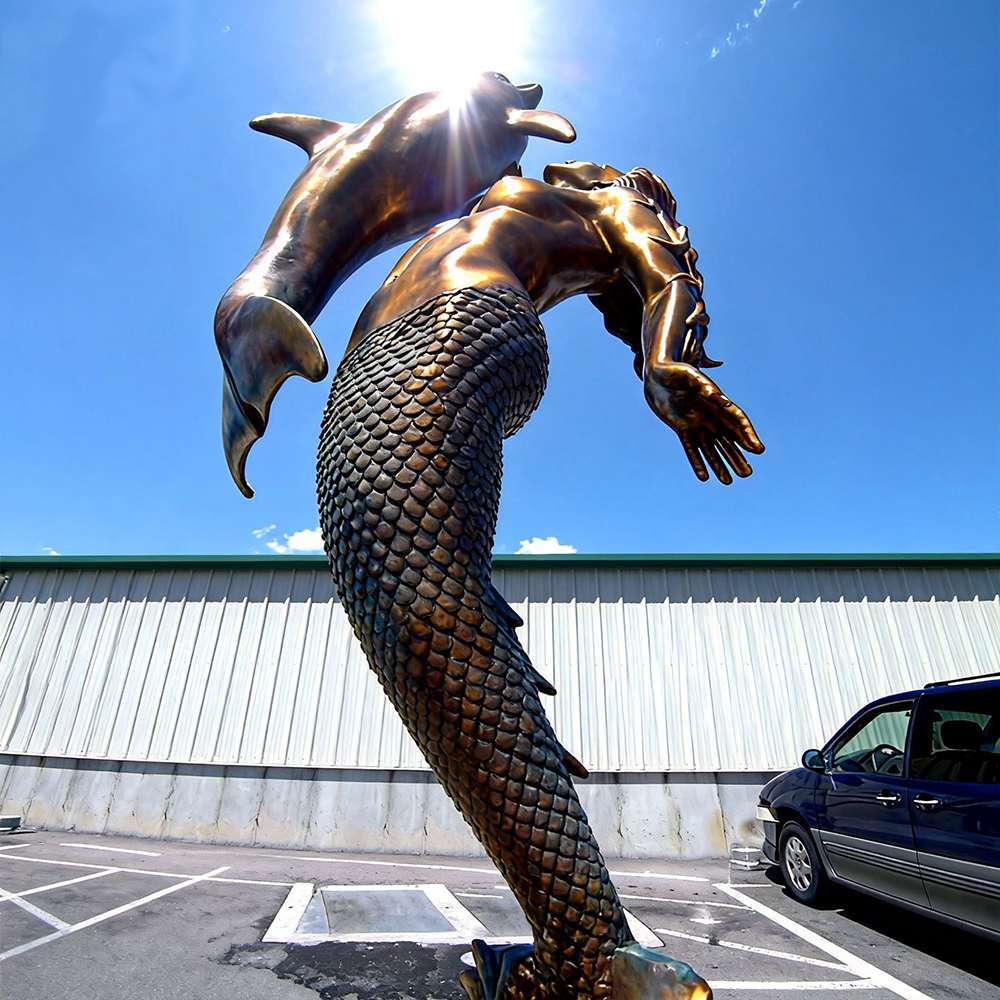 bronze Mermaid and Dolphin Sculpture dynamic interaction pose