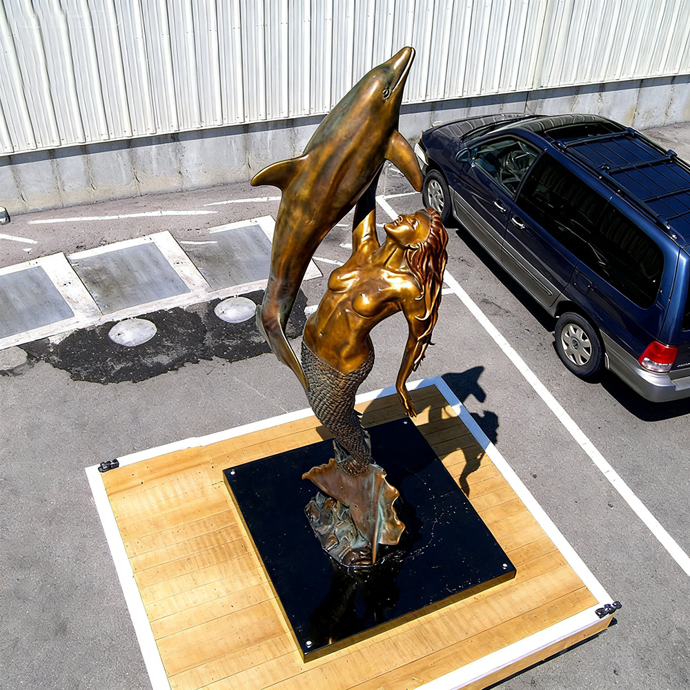 bronze Mermaid and Dolphin Sculpture interaction view