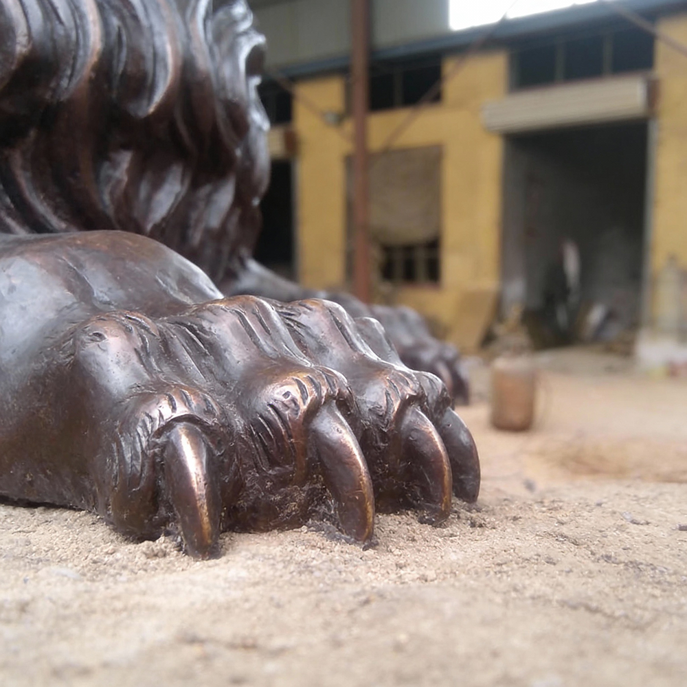 bronze Outdoor Entrance Lion Statue paw close detail