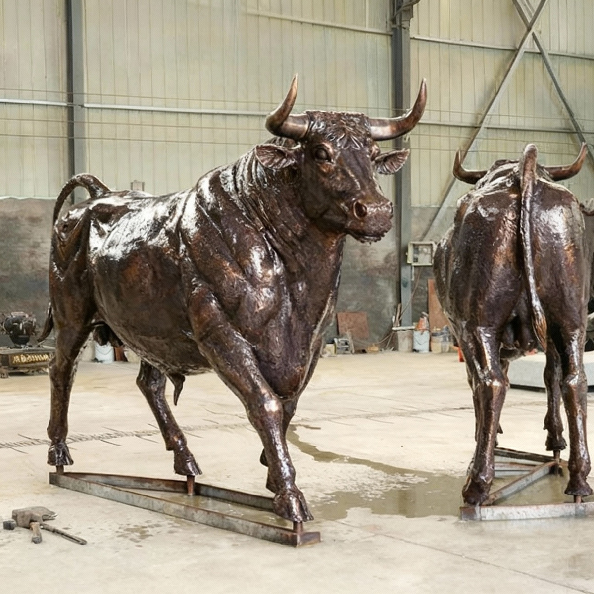 bronze Ox Sculpture side view muscular body and curved horns