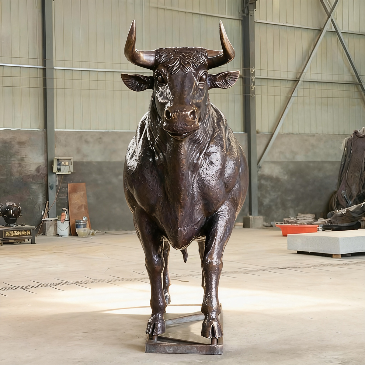 bronze Ox Sculpture with alert eyes front view