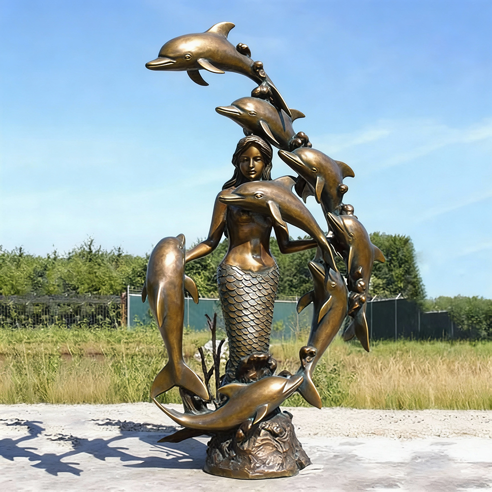 bronze mermaid with dolphins yard statue full view