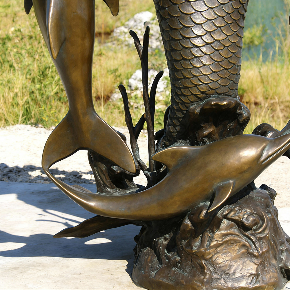 bronze mermaid yard statue close-up view