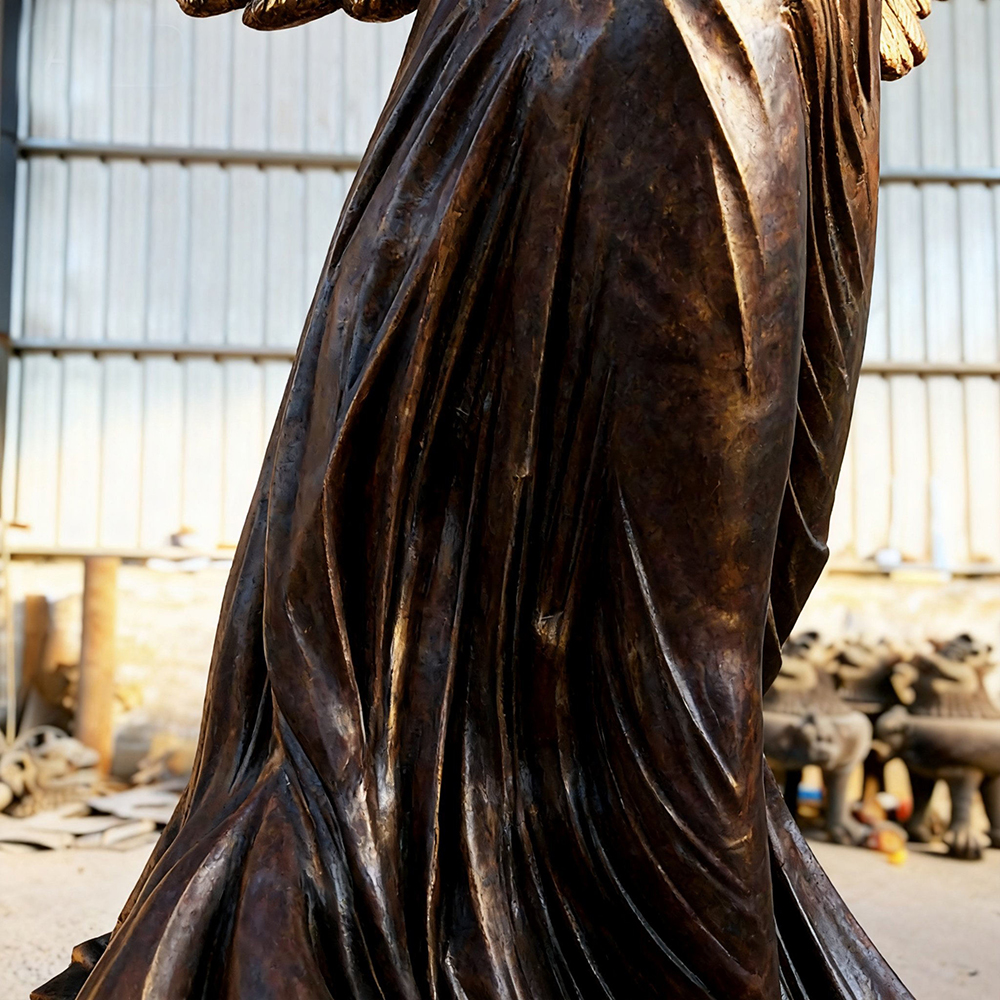 cloth details of the Angel with Dove Statue