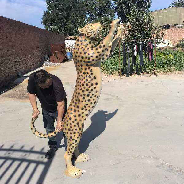 jumping cheetah fiberglass garden statue