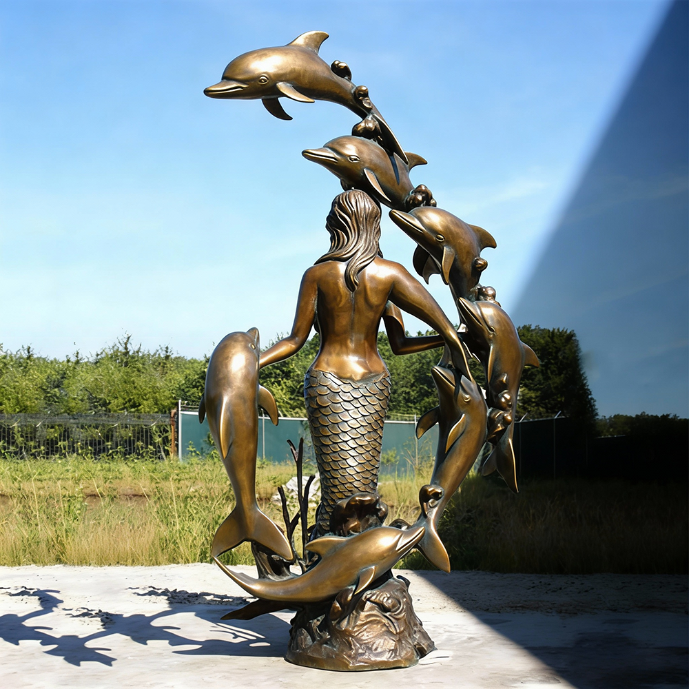 life size bronze mermaid with dolphins yard statue