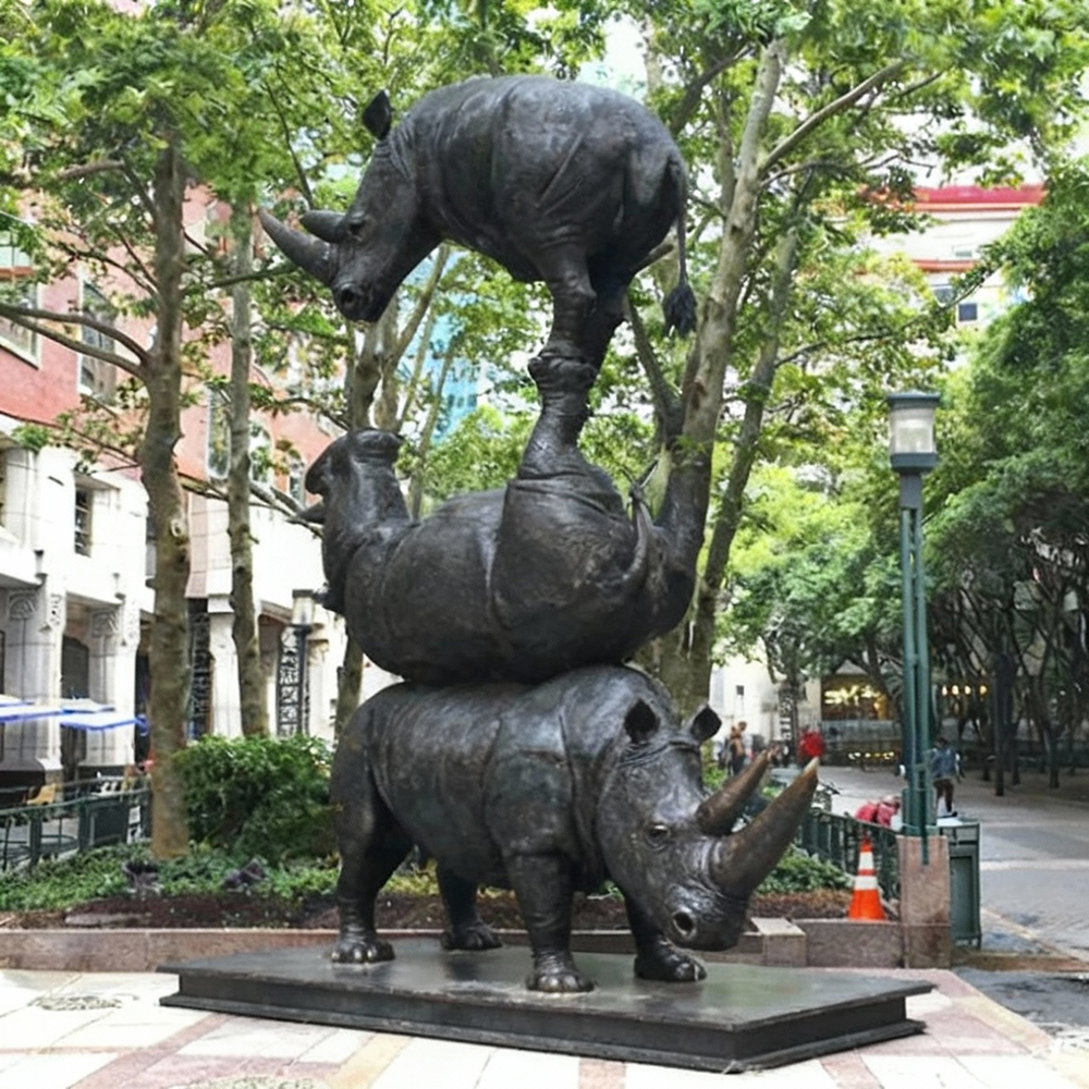 modern bronze The Last Three Rhinos Sculpture