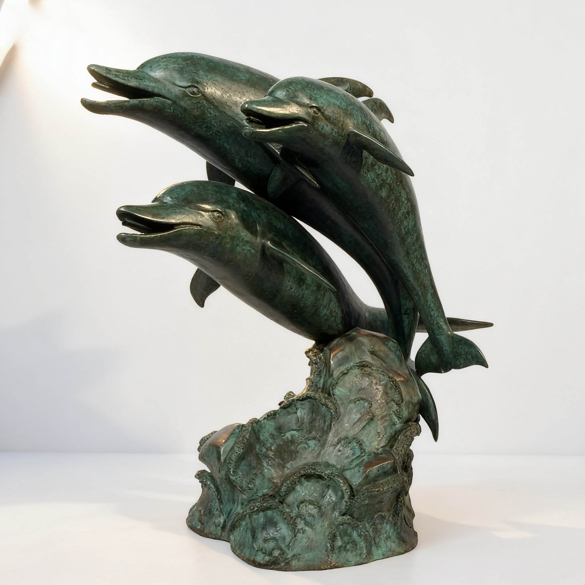 three dolphins jumping bronze sculpture for sale