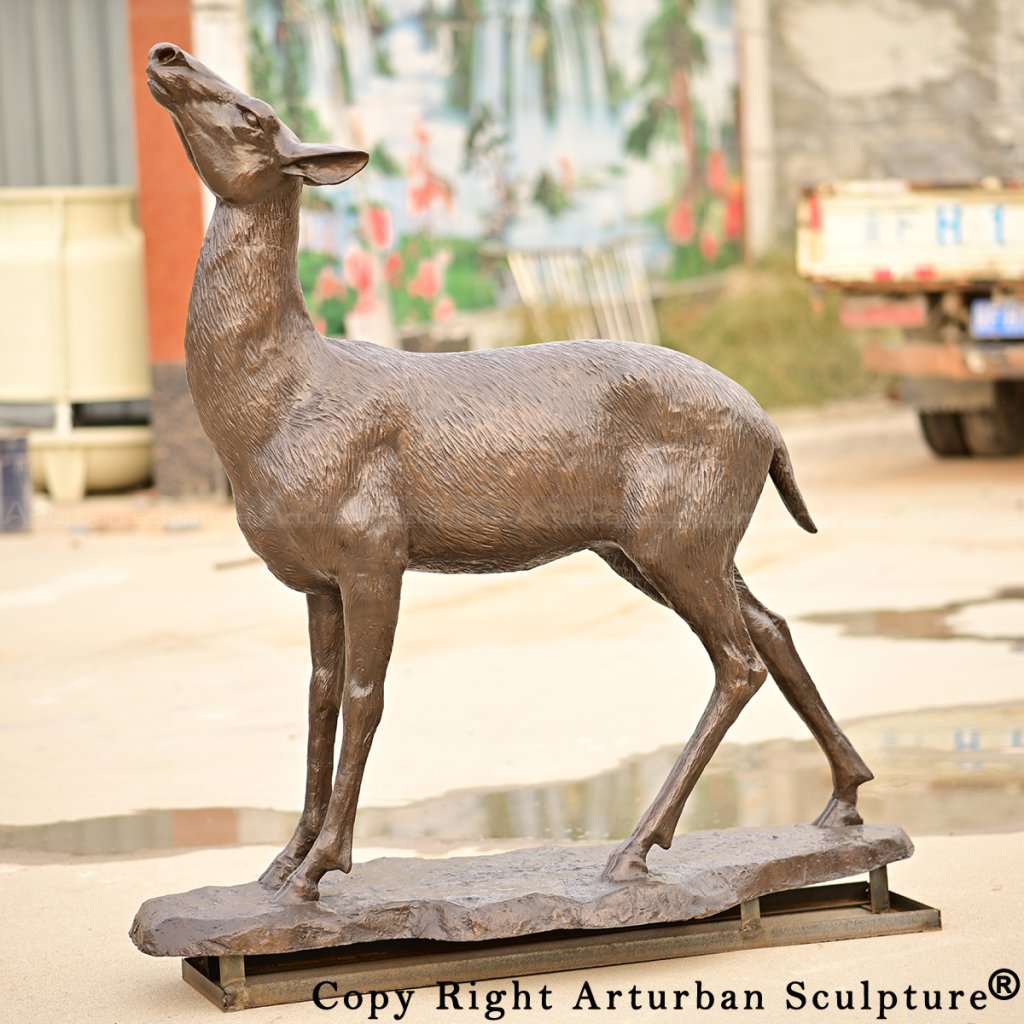 0 bronze female Whitetail Statue head raised