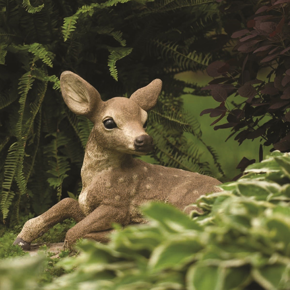 1-(11) Lying fawn decor among green plants