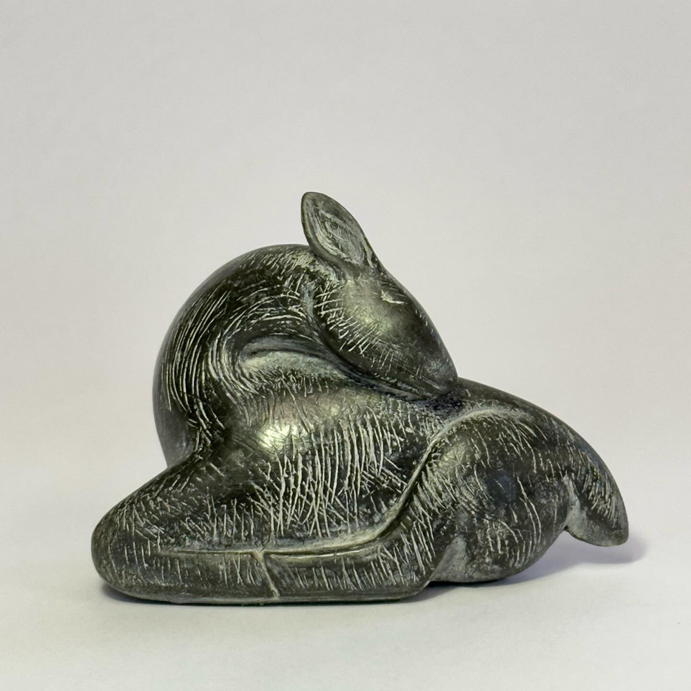 1-(2) Abstract curled fawn statue resting