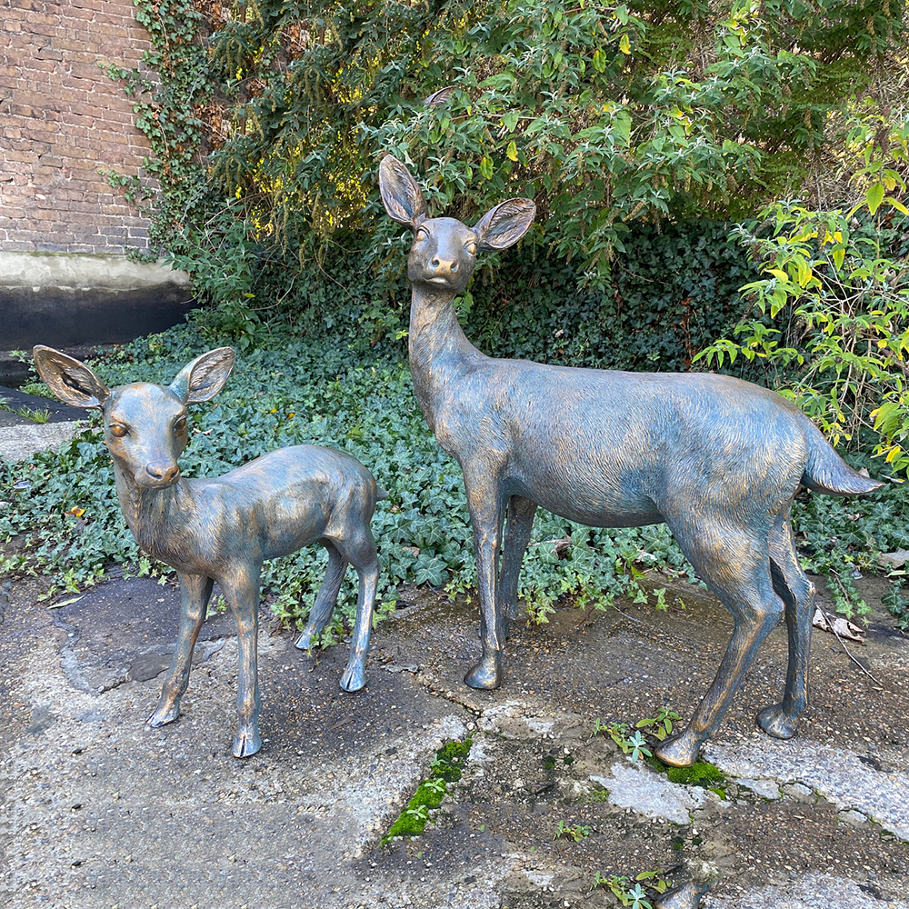 1-(3) Two deer sculptures on stone ground