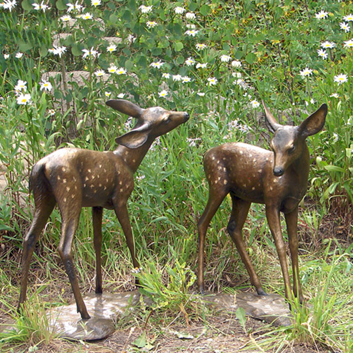 1-(5) Spotted twin fawn deer statue among wildflowers