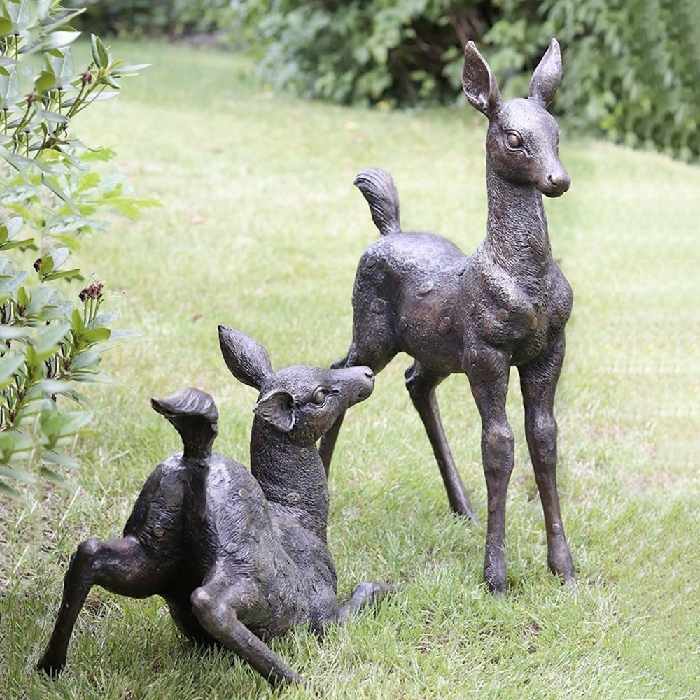 1-(6) Bronze deer pair on grass