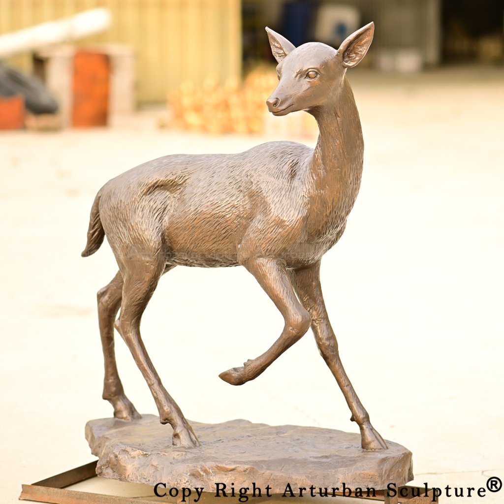 2 Bronze fawn sculpture turning head