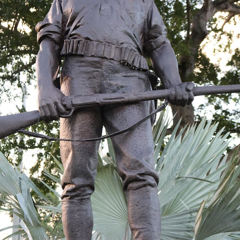 9 (4) The Hiker statue rifle detail