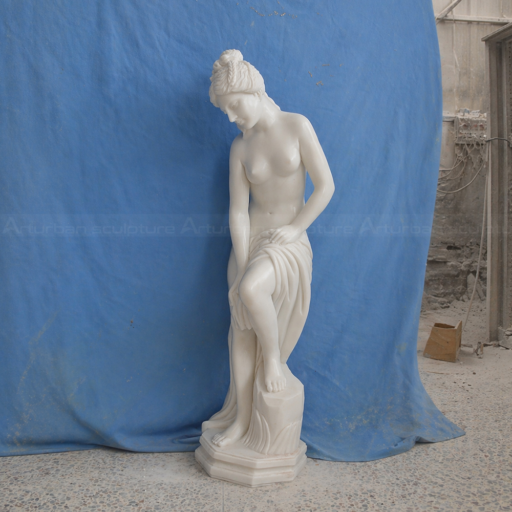 marble aphrodite one leg upbathing statue slender elegant pose