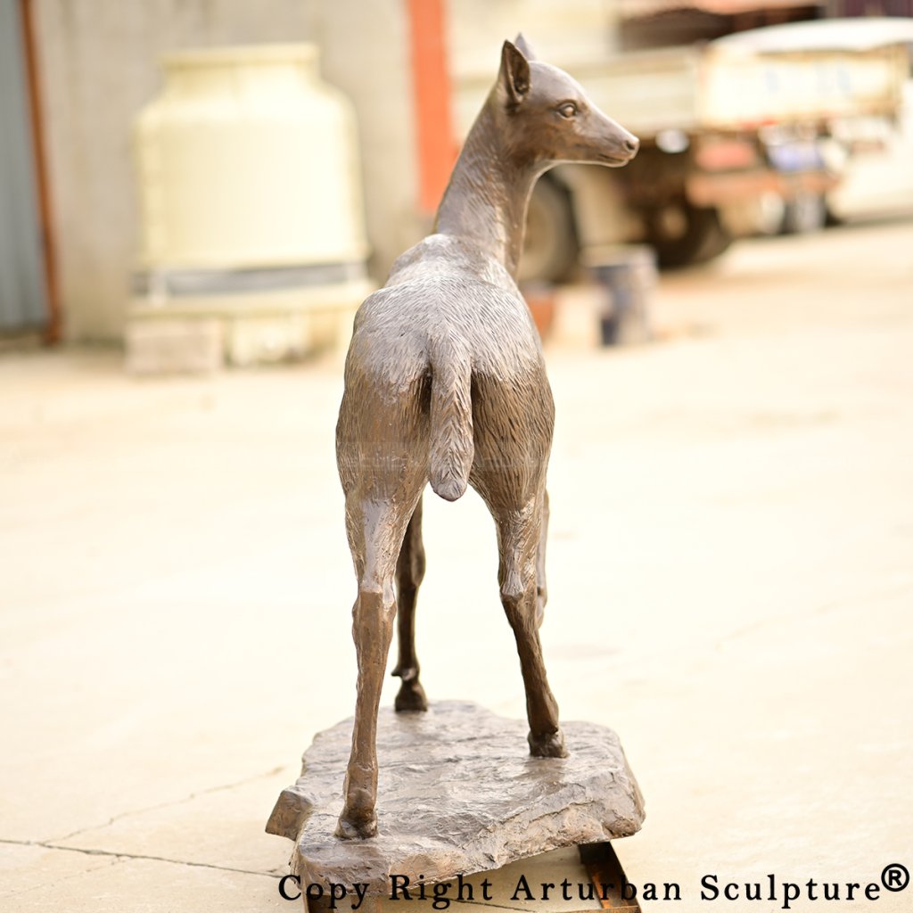 2 Bronze fawn sculpture turning head