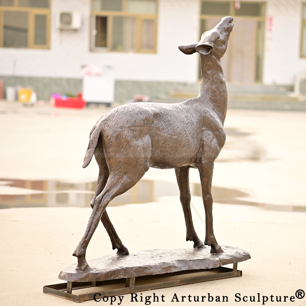 bronze Whitetail doe deer Statue looking up