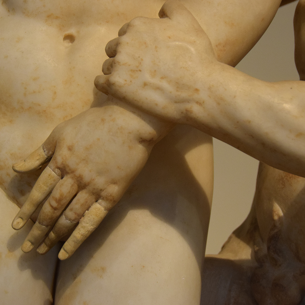 group of Aphrodite, Pan and Eros sculpture detail