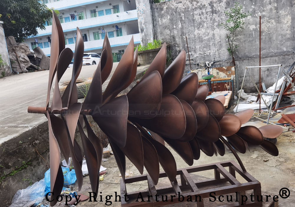 6 large Corten steel pine cone