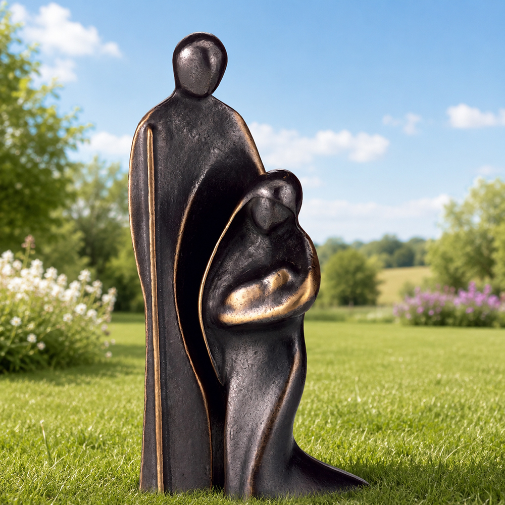 Abstract bronze holy family statue outdoor garden