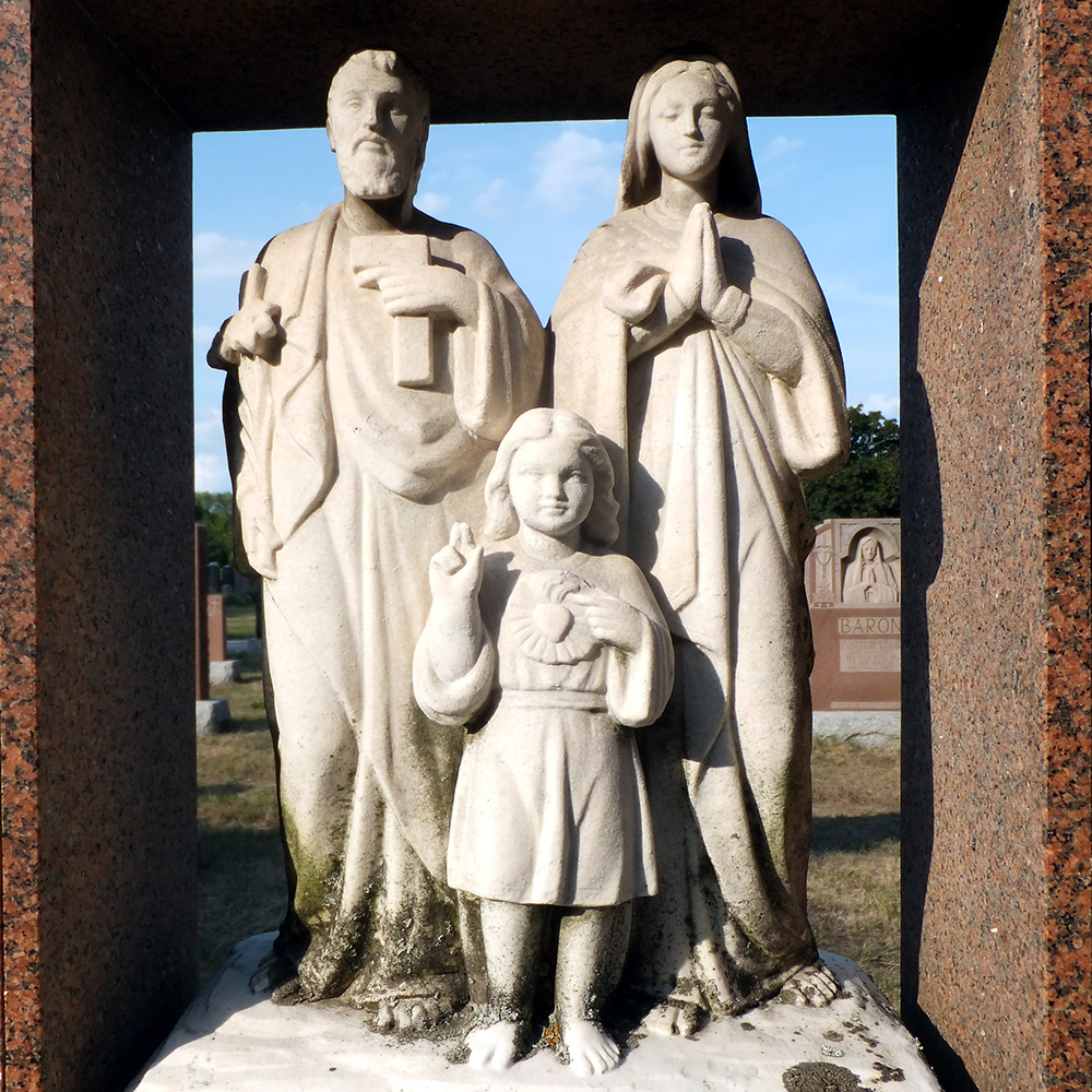 Cemetery holy family statue outdoor stone memorial