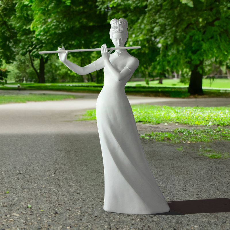 Fiberglass Flute Player Sculpture in garden