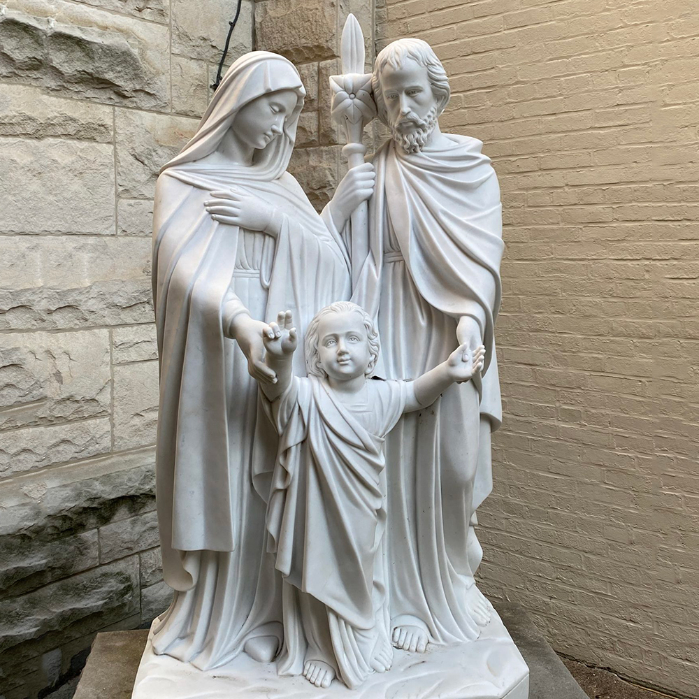 Marble-Holy-Family-statue-in-courtyard-corner