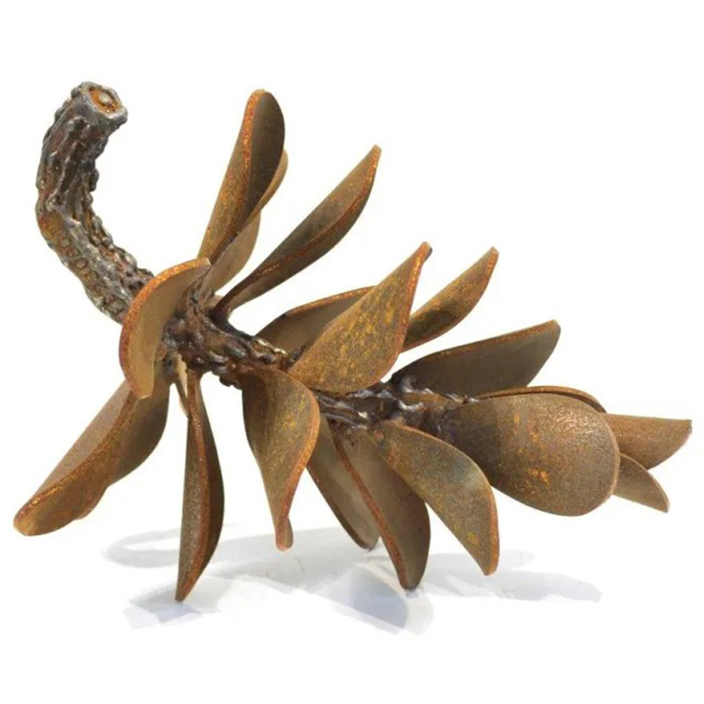 Small layered metal scale artwork