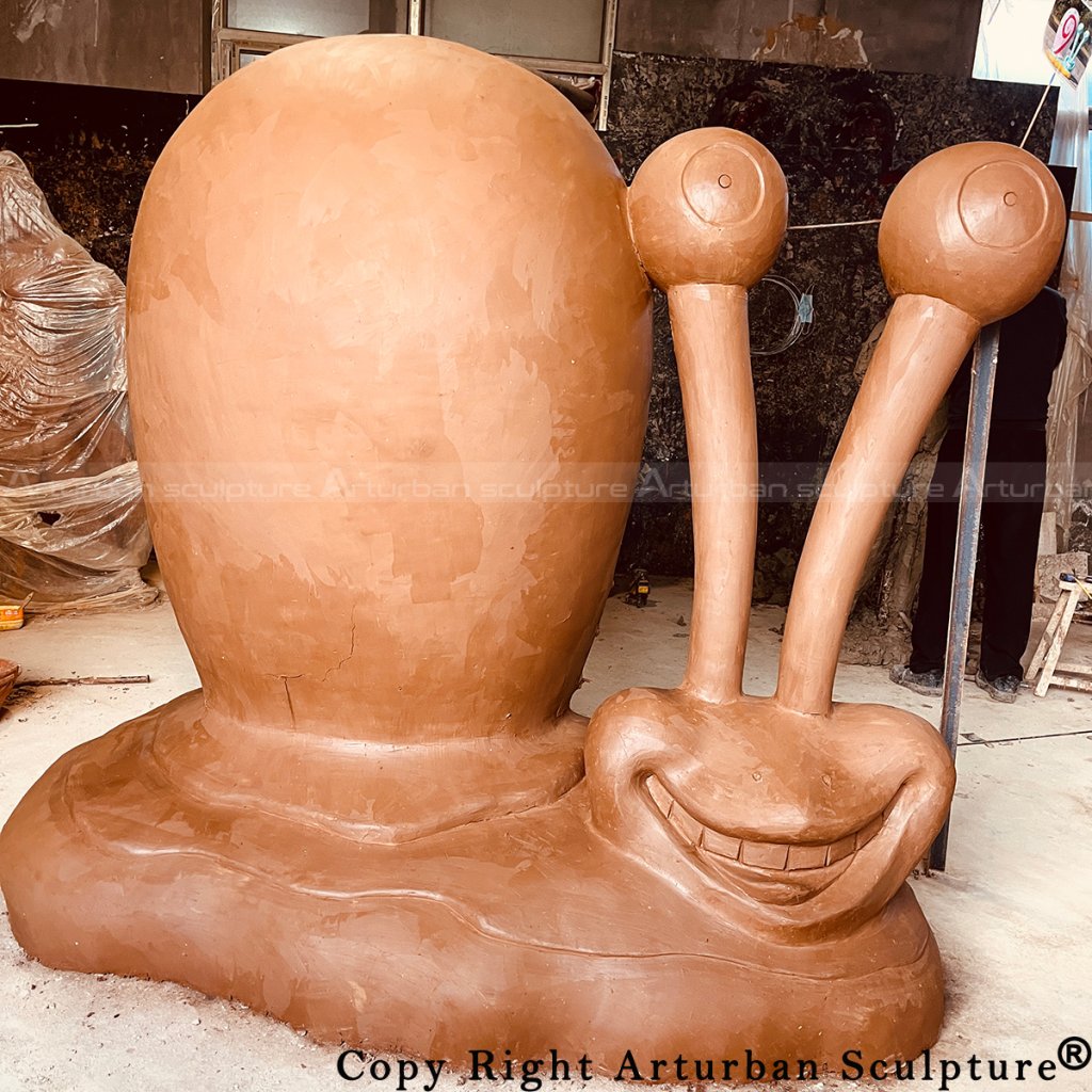 clay-mold of gary the snail statue