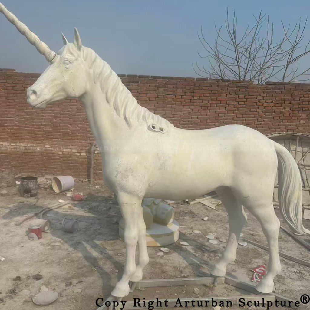 5 White fiberglass unicorn body before wing assembly