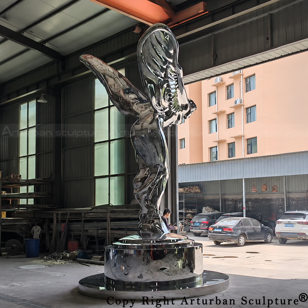 8 Polishing The Spirit of Ecstasy statue