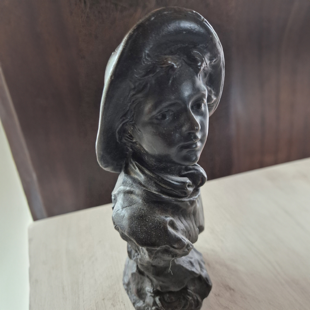 Bronze Bust of a Young Boy angled portrait