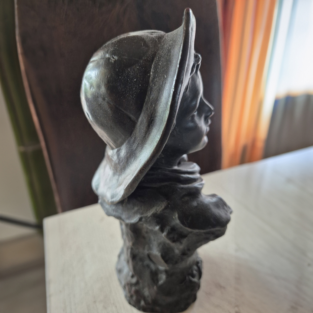 Bronze Bust of a Young Boy hat profile