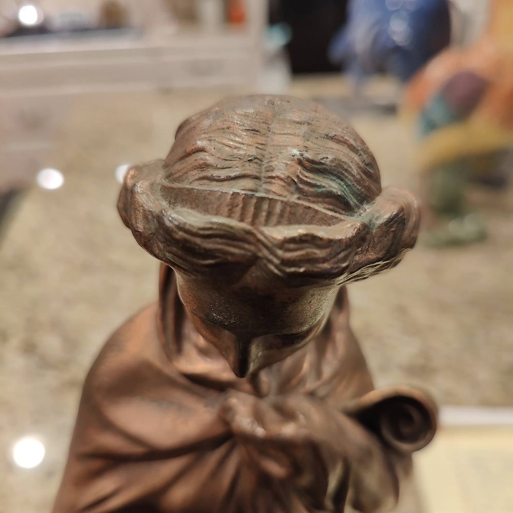 Bronze Female Figure hair closeup