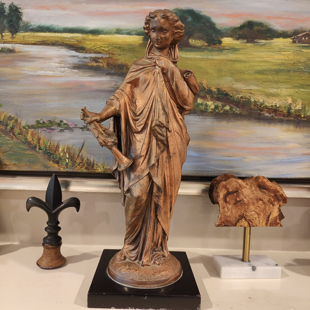 Bronze Female Figure with classical horn