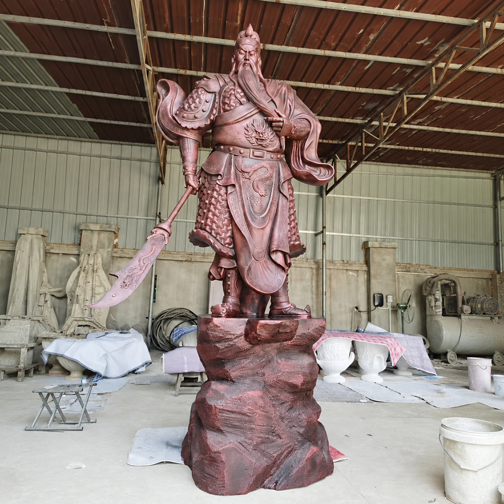 Bronze General Guan Yu Statue on rock