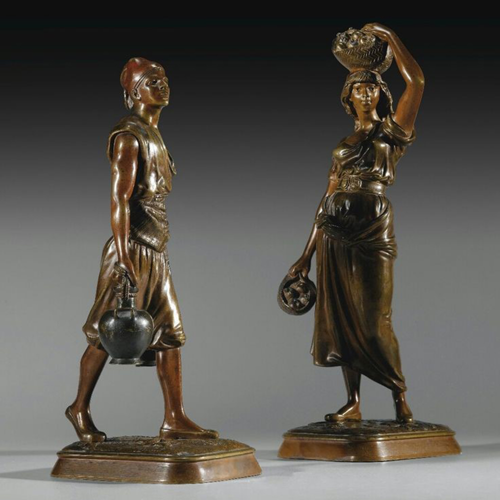 French Bronze Sculpture shows water carrier with fruits carrier