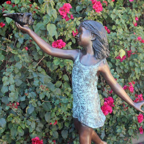 Girl on Turtle bronze garden Statue