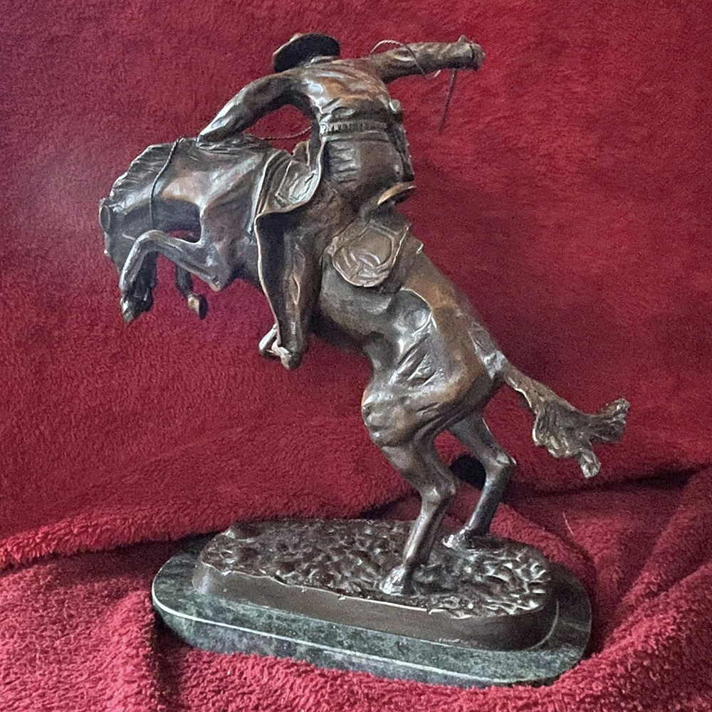 The Bronco Buster Statue bronze rear angle