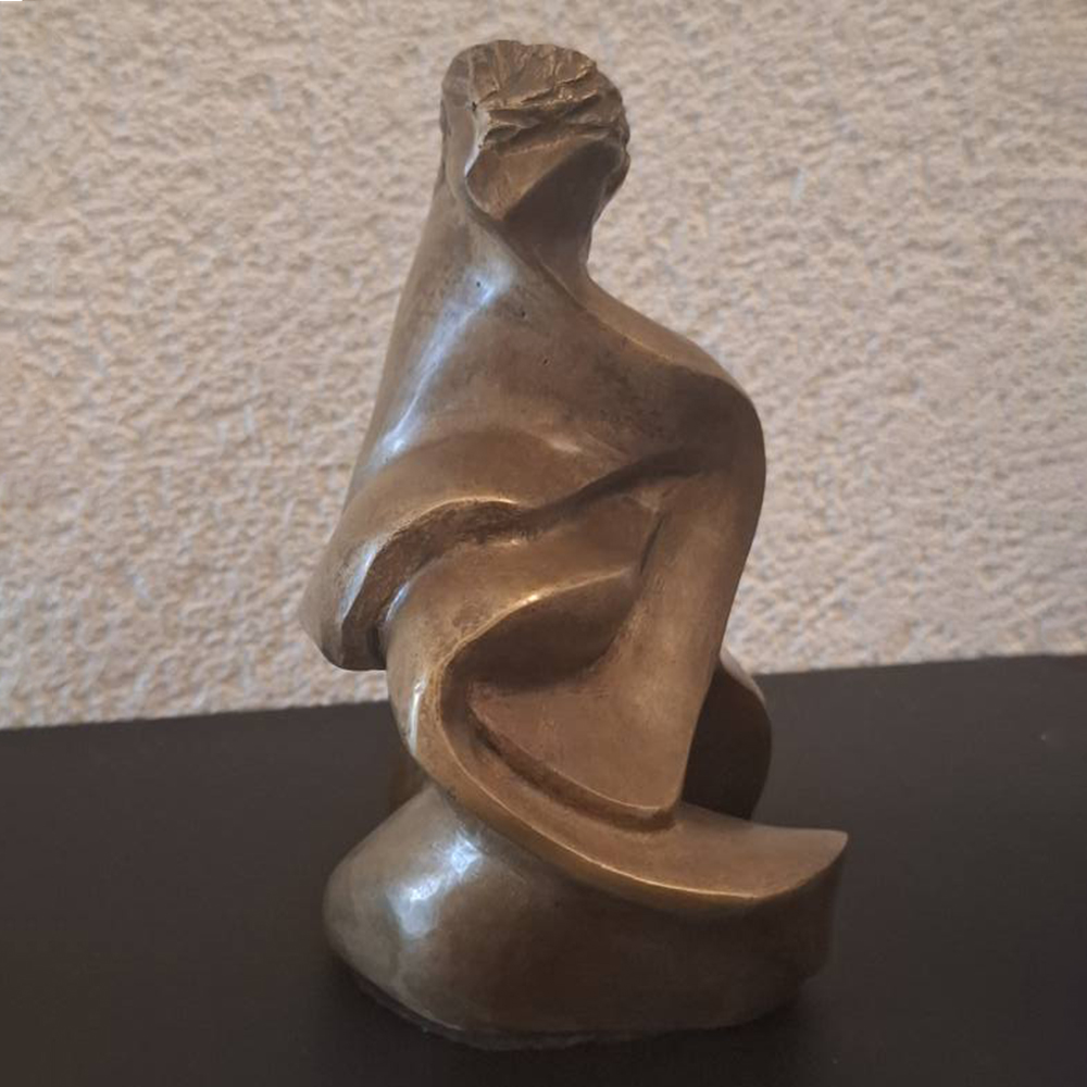 Vintage abstract sculpture flowing female form