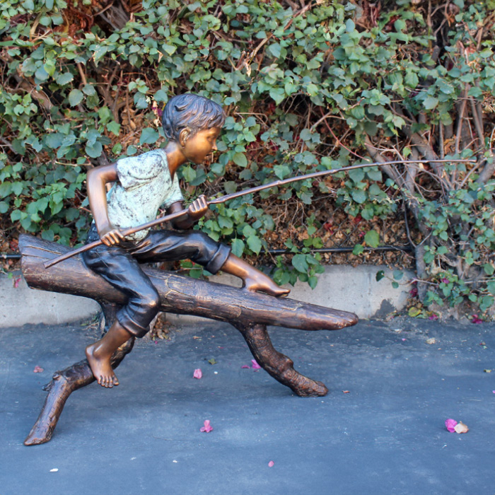 bronze Boy Fishing on Log Statue garden