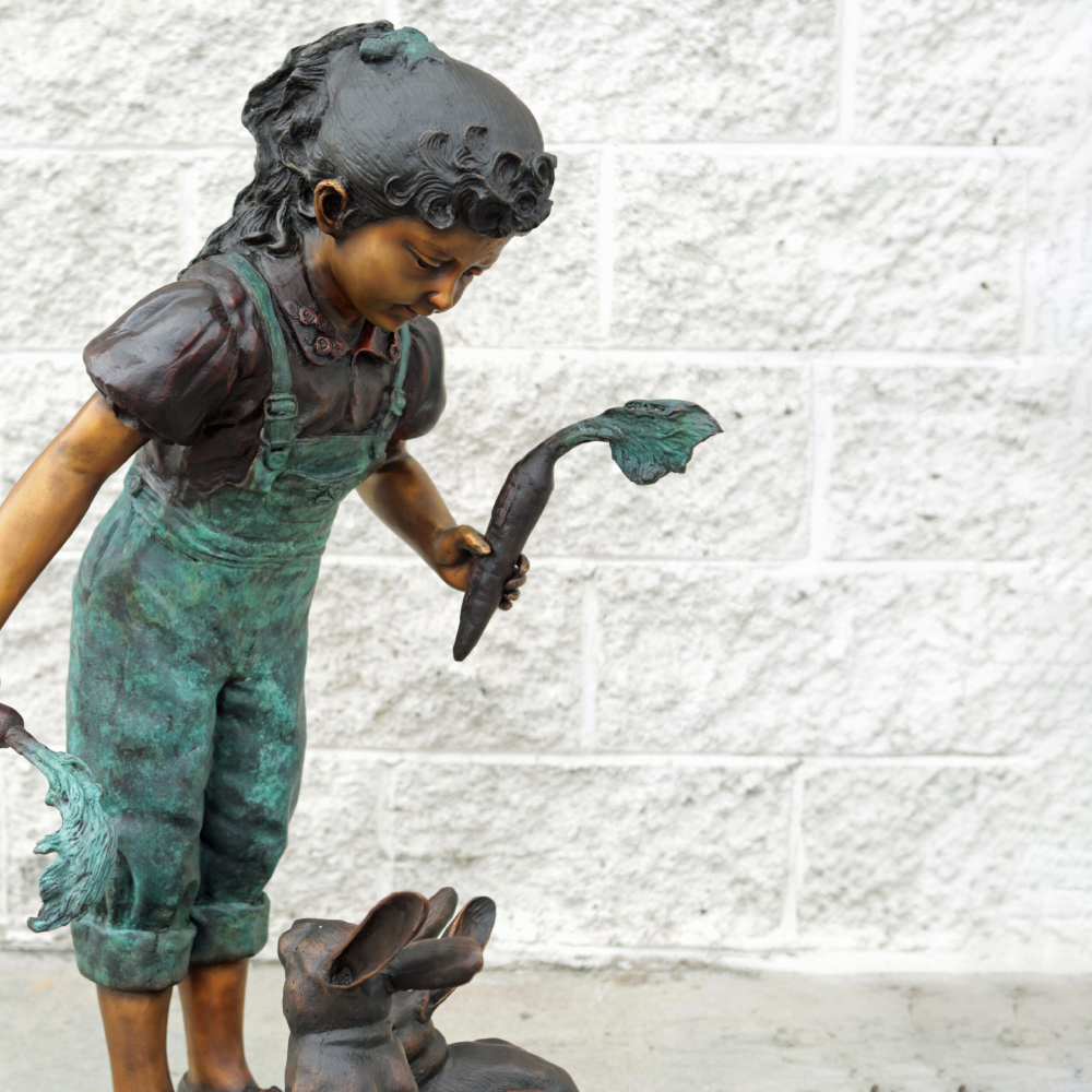 bronze Girl Feeding Rabbits Statue close detail view