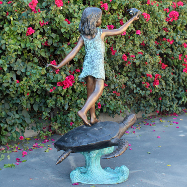 bronze Girl on Turtle Statue rear ocean base